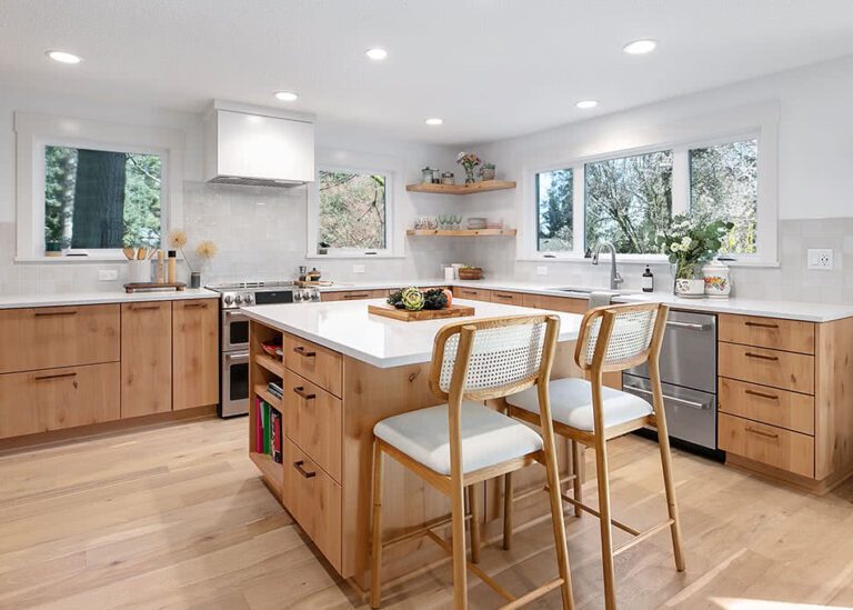 Alder kitchen cabinets with walnut hardware.
